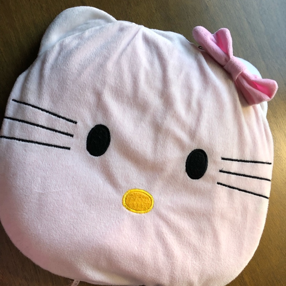 Hello Kitty Pink Pillow with Bow and opens into lite blanket